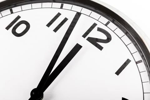 Close up of a wall clock. Time management concept Stockfoto's
