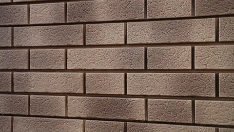 Close-up of wall of house from light flexible facade panel imitation of clinker Stock Footage 166175828