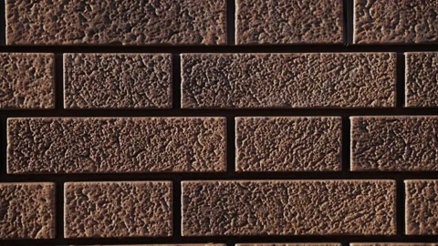 Close-up of wall of house from red flexible facade panel imitation of clinker Stock Footage 166748889