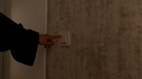 Close-Up of Wall Light Switch with Lights Turned Off – Home Lighting Stock Footage 302687284
