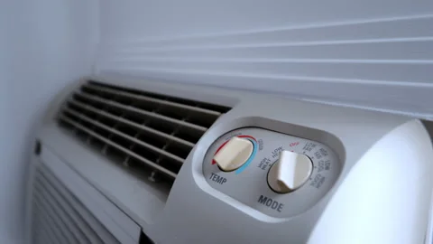 Close up of a wall mounted air conditioner control panel. Adjustable temperature Stock Footage 332185666
