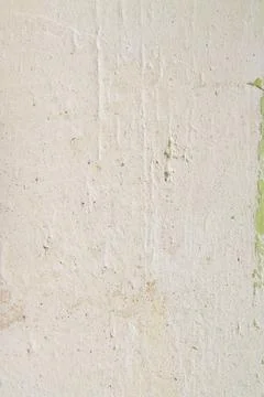 Close-up of wall plaster being smoothed during repair preparation. Suitable.. Stock Photos