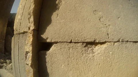 Close-up of a wall ruins of a Roman Temple Doorway, two thousand-year-old city Stock Footage 81745582