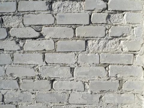 Close-up of a wall of white blocks. cement mix between blocks Foto stock