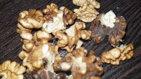 A close-up of the walnut kernel reveals the flavorful Stock Footage 331034559