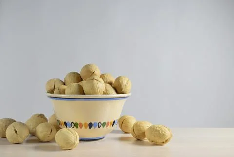 Close-up of walnuts in a ceramic bowl Stock Photos