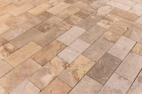 Close-up of warm beige stone tile flooring Stockfoto's