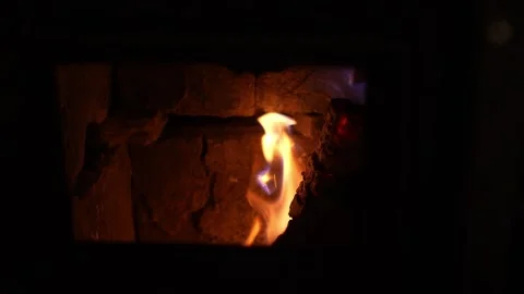 Close-up of a Warm Fire burning in a Fireplace. Stock Footage 254037626