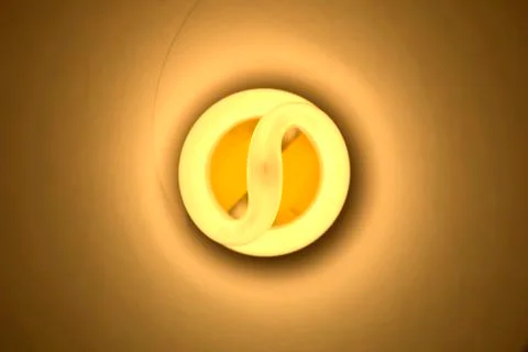 Close up of a warm light CFL bulb. Stock Photos