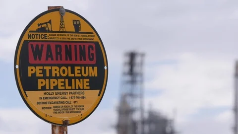 Close Up Warning Petroleum Sign Refinery Out Of Focus Video stock 87300646