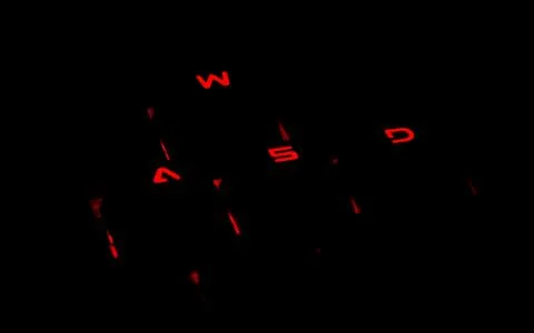 Close up WASD. Red backlight, backlit keyborad computer of gaming in the dark Stock Photos