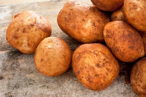 Close up on washed raw potatoes Stock Photos