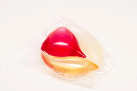 Close-up of washing machine capsule. Stock Photos