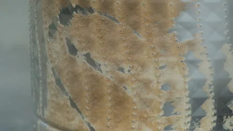 Close-up of washing machine drum descaling with high-pressure cleaner. Stock Footage 197395589