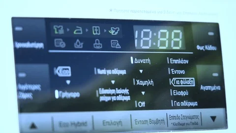 Close up of washing machine panel in Greek Stock Footage 120072759