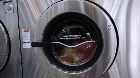 Close-Up,The washing machine is running. Stock Footage 140611881