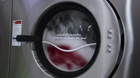 Close-Up,The washing machine is running. Stock Footage 140611904
