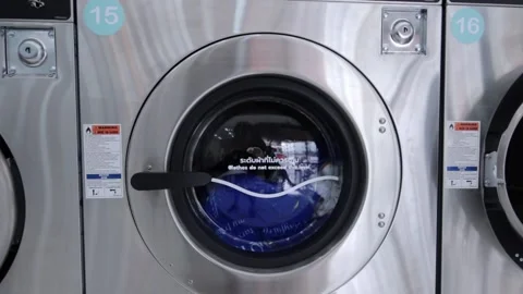Close-Up,The washing machine is running. Stock Footage 140611909