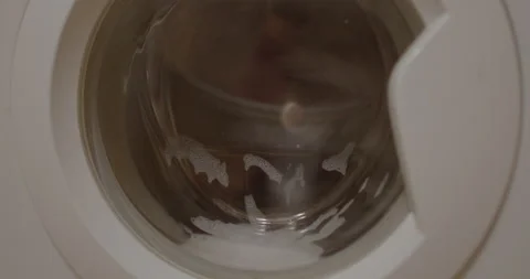 Close up washing machine running. Power lost during cycle. Water and electricity Vídeos de archivo 178885055