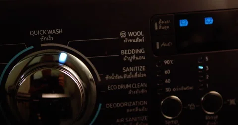 Close -up of a washing machine's control panel showing the buttons, knobs 動画素材 277252039
