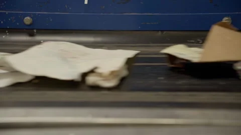 Close-up of waste on a conveyor in a sorting center Stock Footage 255015588
