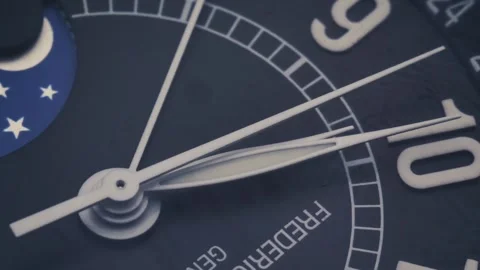 Close-Up of a Watch Face with Moon Phase Indicator Vídeos de archivo 301713674