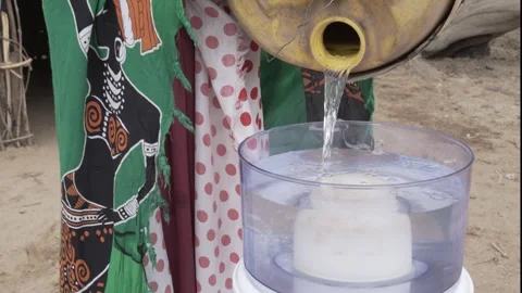 Close up of water being poured into filter. Stock Footage 319299633