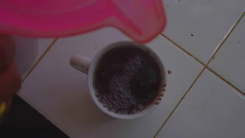 Close-up of Water being poured into tea cup Video stock 107537048