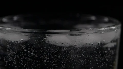 Close-up water bubbles in a glass Stock Footage 123199007