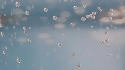 Close-Up of Water Bubbles Transition from Calm to Turbulent Motion Video stock 330941859