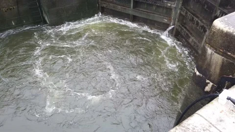 Close up of water coming out of the locks Stock Footage 143713758