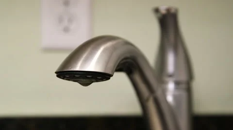 Close up of water dripping from tap Stock-Footage 61351102