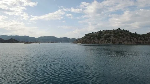 Close water drone shot of leaving yacht. Kekova Bay. Turkey. DJI-0294-02 스톡 동영상 102494124