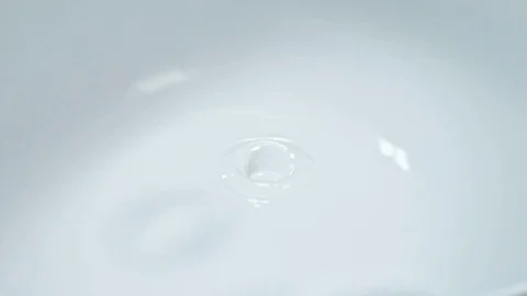 Close up of water drop ripple in clean water Stock Footage 110674874