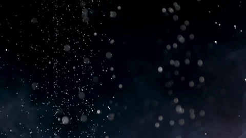 A Close up of Water Droplets Falling Against a Dark Background Stock Footage 270300959