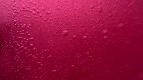 Close-Up of Water Droplets on a Red Surface Stock Footage 274852195