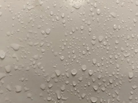 Close up water droplets on smooth surface. Stock Photos
