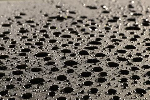 Close-Up of Water Droplets on Surface Stock Photos