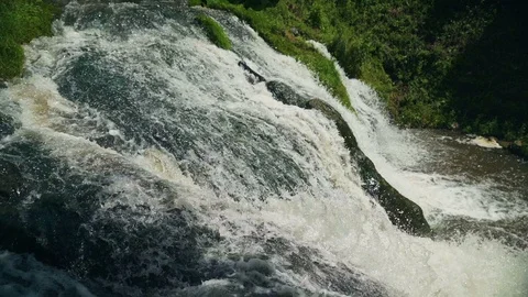 Close up Water dropping on stones, waterfall. Slow motion Stock Footage 92465688