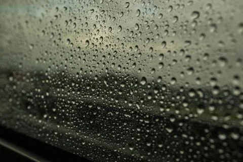 Close up on water drops on a car window Stock Photos