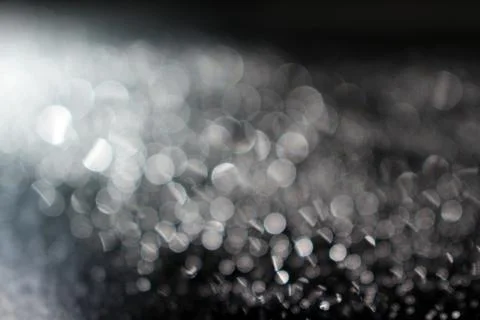 Close up of water drops on the dark stone table surface Stock Photos