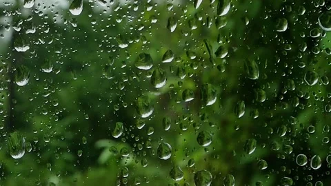 Close-up of Water Drops on Glass of Window. Stock Footage 215896267