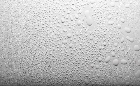 Close up of water drops on gray tone background. Abstarct black wet texture w Stock Photos