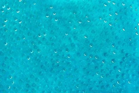 Close-up water drops pattern on glass surface abstract background. Toned aqua Stock Photos