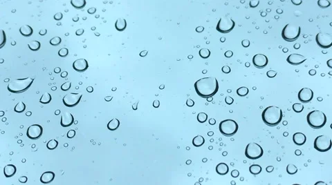 Close up of water drops running on car windshield Vídeo Stock 66525595