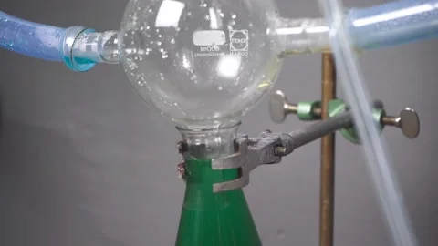 Close up of water drops in steam condenser in chemistry lab, 4K Stock Footage 133931253