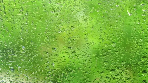 Close up Water Drops on window Glass on a rainy day, Water droplets on frosted g 스톡 동영상 221536670