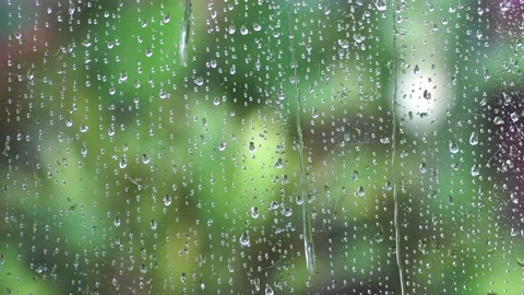 Close up Water Drops on window Glass on a rainy day, Water droplets on frosted g Stock Footage 221539946