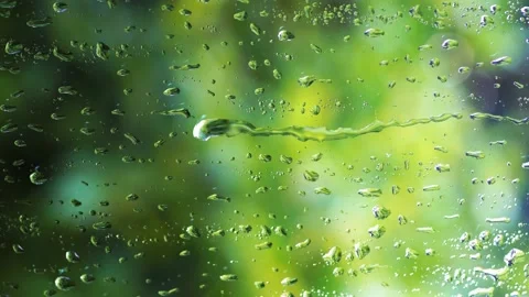 Close up Water Drops on window Glass on a rainy day, Water droplets on frosted g Stock Footage 221543561