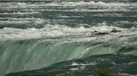 Close-up of water falling over the edge at Niagara Falls Stock Footage 365174